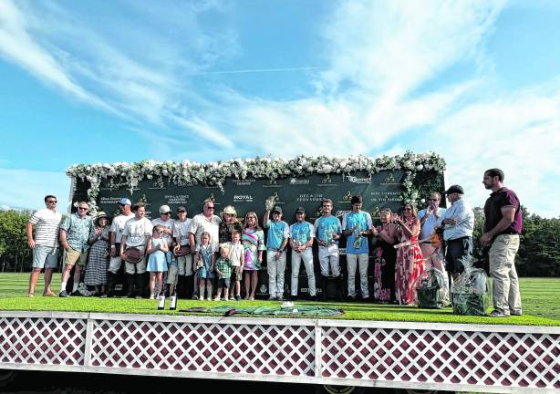 <b>First Hope Bank and Lakeside Construction celebrated their tying score at the Project Self-Sufficiency Fall Polo Classic which was held at the Grayfields Polo Club in Allamuchy.</b>