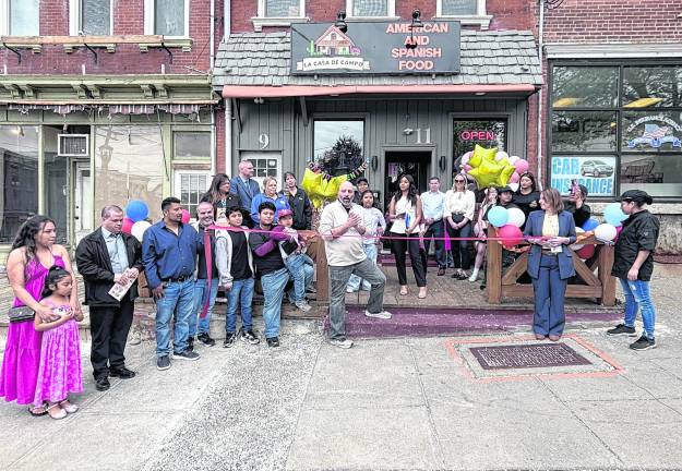<b>The ribbon is cut on the Town of Newton’s newest eatery, La Casa De Campo, located at 11 Main Street in Newton. Family owned and operated, they offer Spanish-American food which includes steak, chicken, seafood and burgers. </b>