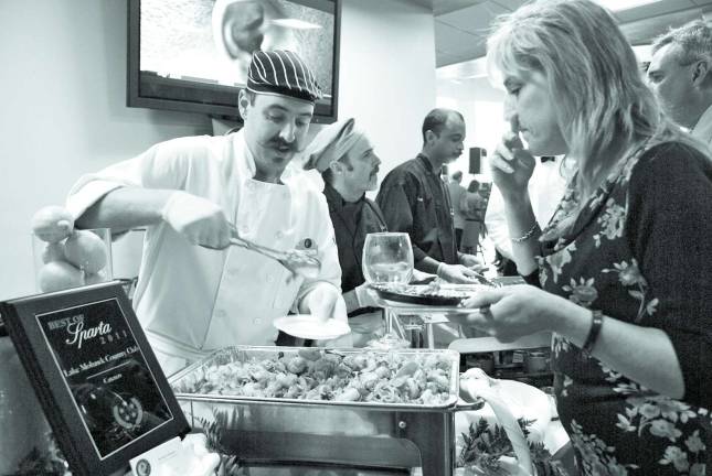 Amy Passafaro and the chefs from the Lake Mohawk Country Club