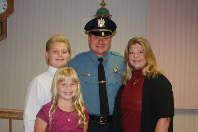 Officer Rod Mosner and family.