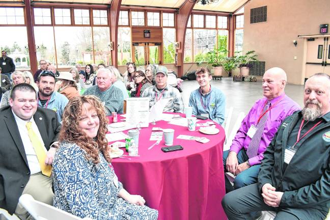 <b>County officials pose for a photo.</b>