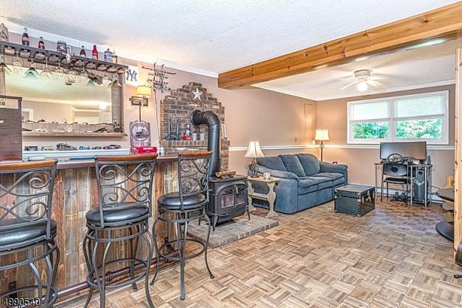 Embrace country life in this lake community home