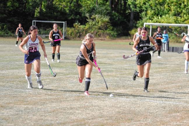 Wallkill Valley's Jenna Cammarata, center, controls the ball.