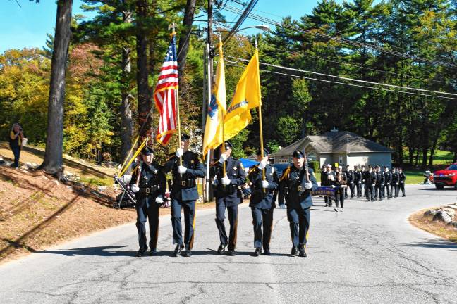 <b>ID6 Members of the Allamuchy Fire Department march in the parade.</b>