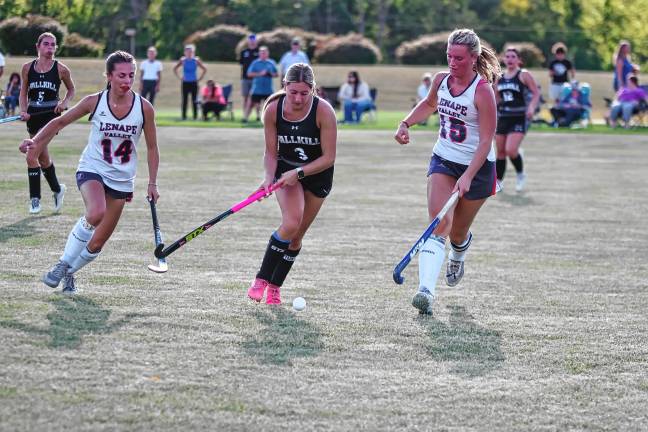 Lenape Valley and Wallkill Valley players pursue the ball.