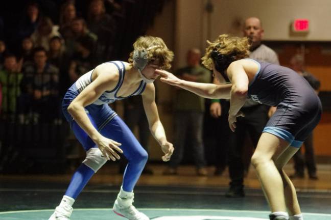 Kittatinny's Troy Sharp, left, faces Sparta's Johnathan Petelicki in the 106-pound weight class. Sharp pinned Petelicki in 3:27 on Jan. 26.