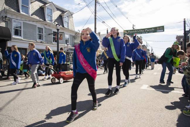 Members of the An Clar School of Irish Dance in Byram show off a few steps in the parade.