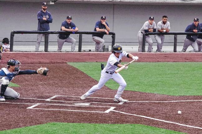 <b>MN2 In the third inning, Miners batter Hunter D'Amato bunts the ball. He made one run.</b>