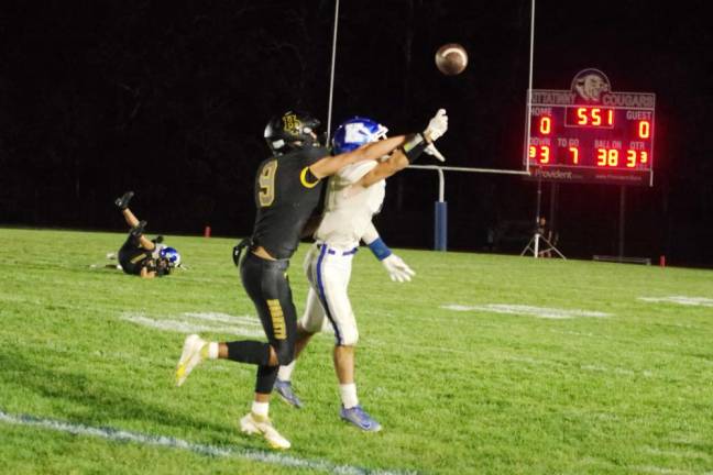 FB3 Hanover Park defensive back Michael Farrell (9) knocks the ball away, preventing a catch by Kittatinny running back Jacob Savage, in the third quarter of their game Thursday, Sept. 14. (Photos by George Leroy Hunter)