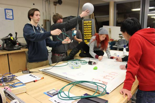 The Newton Robotics Team works on planning and designing ideas for this year's new robot,