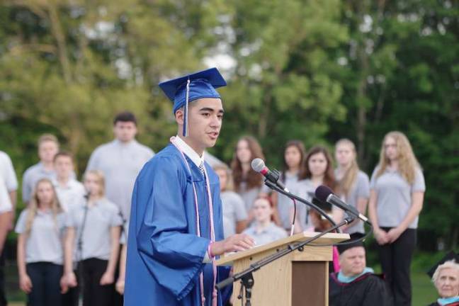 President of the Class of 2015 Dominick Alcantara speaks.