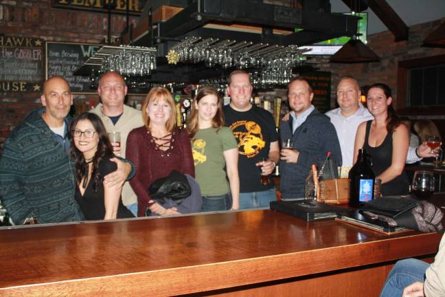 Celebrating Protect &amp; Serve, from left: Mohawk House owner Steve Scro, Ana Stefano, Byram Police Chief Pete Zabita, Stephanie Zabita, Angry Eric owners Heidi and Erik Hassing, Sparta Police Chief Neil Spidaletto, Sparta Deputy Mayor Josh Hertzberg and Tina Young.