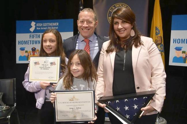 Rep. Josh Gottheimer poses with members of George Ambrose’s family. He was unable to attend the ceremony.