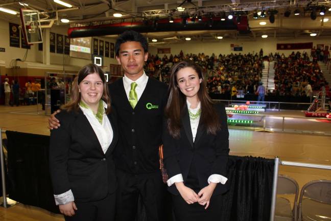 From left: Team Aperture members Magda Dworzycki and Mohammad Balatero, both of Newton, and Tess Bugay of Green Township, wrote the award submission and gave the presentation that won Team Aperture the prestigious FIRST Engineering Inspiration Award.