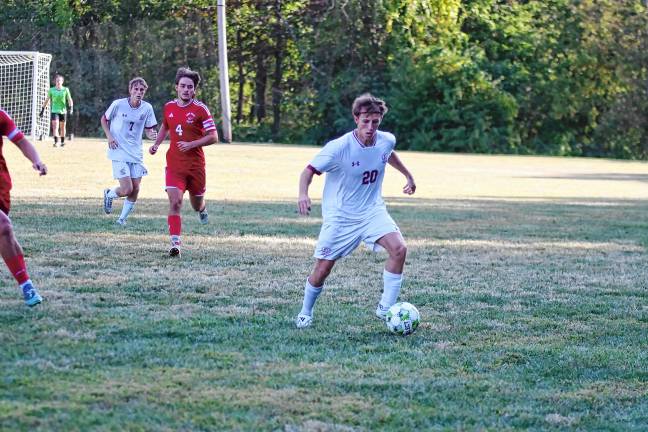 BR1 Newton's Jack Boffa controls the ball during a soccer game Sept. 12 at High Point. The Braves won, 2-1. (Photos by George Leroy Hunter)