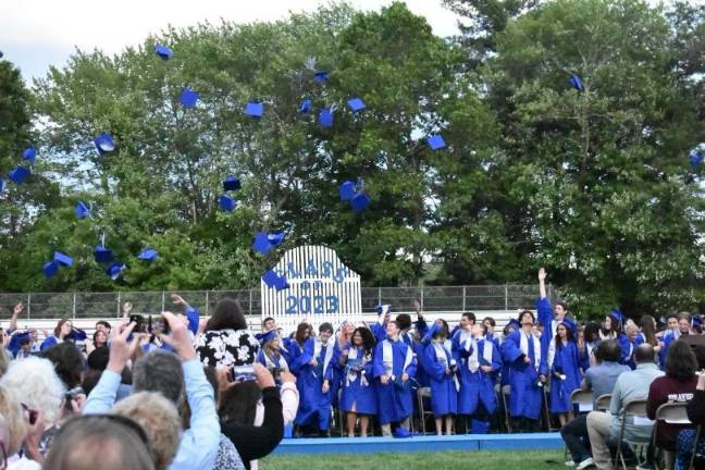 Members of the Kittatinny Regional High School Class of 2023 throw their caps in the air. (Photos by Laura Gordon)