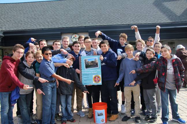 St. Kateri Squires collecting donations in front of the Sparta parish