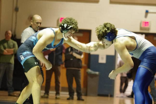 Sparta's Lucas Brown, left, faces Kittatinny's Alex Laoudis in the 215-pound weight class. Brown won by ultimate tie breaker, 3-2.