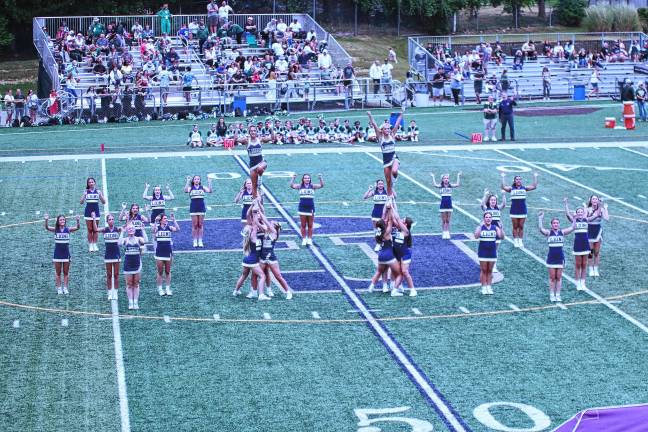 <b>The Pope John cheerleaders perform during a halftime show. (Photo by George Leroy Hunter)</b>