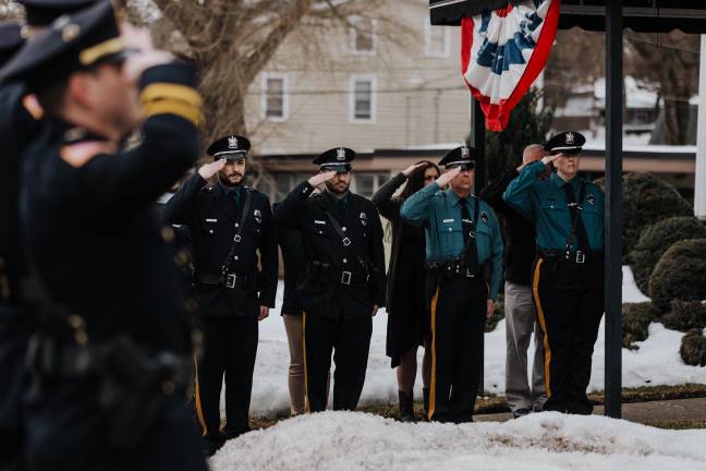 A final salute to Lt. Michael Monaco at Smith-McCracken Funeral Home.