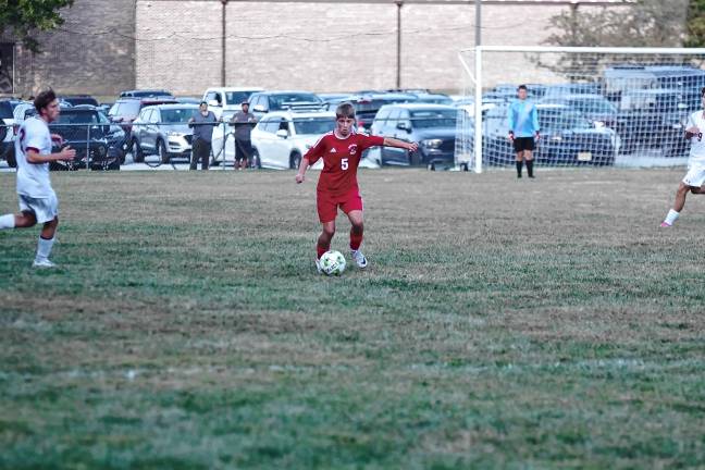 A High Point player controls the ball.