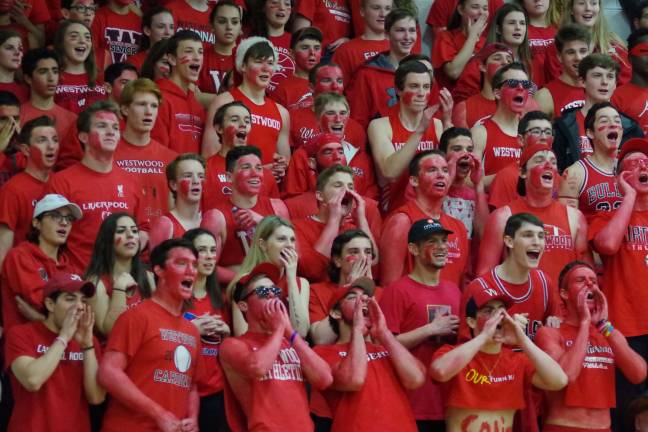 The Westwood Cardinals fans express their enthusiasm.