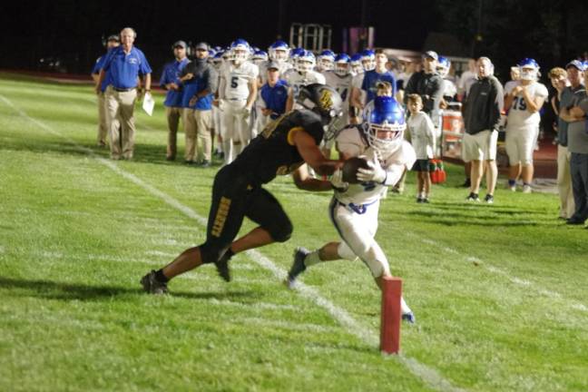 In the second quarter, Kittatinny running back Jacob Savage is shoved out of bounds just short of the goal line by Hanover Park linebacker Hector Lopez III.