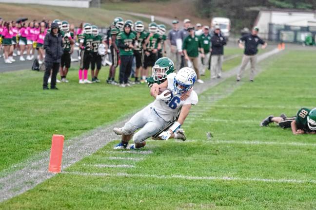 <b>Kittatinny ball carrier Lucas Inglima is brought down just short of the goal line by Sussex Tech cornerback Gavin Gardner in the first half of their game Saturday, Oct. 11 in Sparta. Kittatinny won, 44-12.</b>