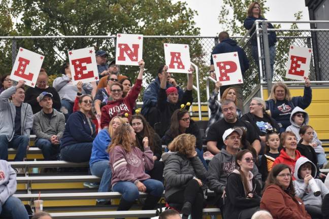 Family and fans from Stanhope cheer on the Lenape Valley Regional High School Marching Patriots during their performance at a band competition Saturday, Sept. 30 in West Milford. (Photos by Rich Adamonis)