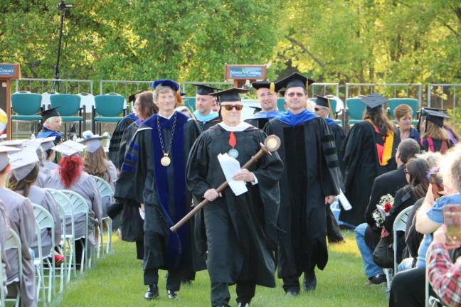 Sussex County Community College officials march out of the commencement ceremony.