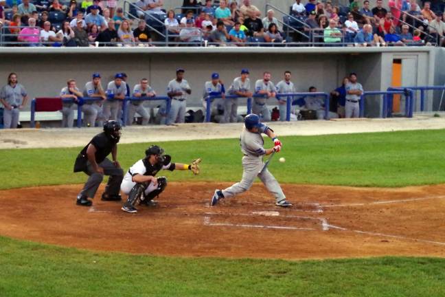 Rockland Boulders batter Pat McKenna about to connect.