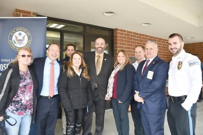 Rep. Josh Gottheimer, second from left, poses with local municipal and police officials.