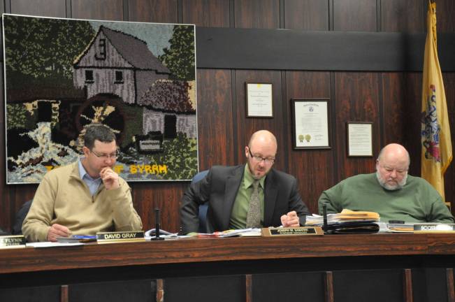 Byram Township Manager Joseph Sabatini (center) heads up the presentation of the township's capital budget. Deputy mayor David Gray is pictured at left and councilman Scott Olson at right. Photo by Jennifer Jean Miller.