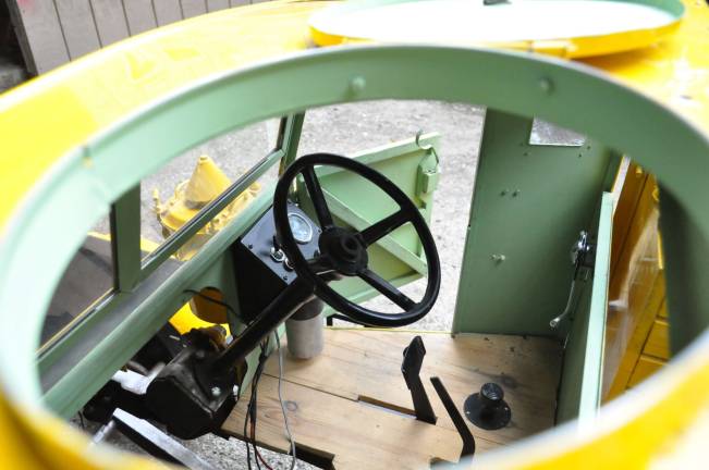 Photos By Robert Oszust The &quot;Baby Scammel&quot; features four wheel drive, a manual transmission, and tops out at 15 mph.