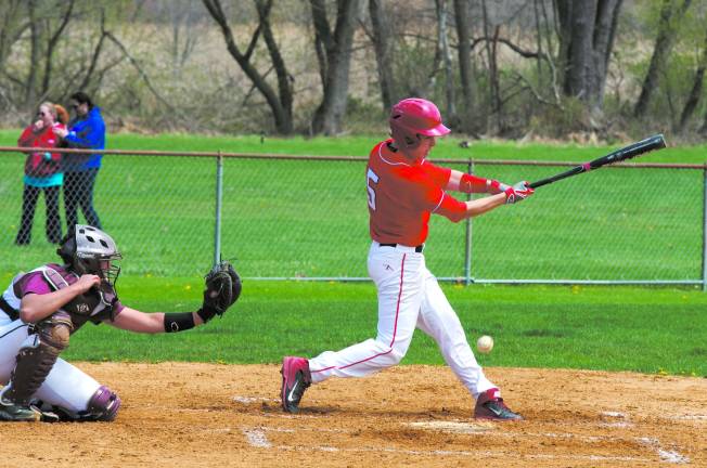 Lenape's Dan Rafferty foul tips the ball.