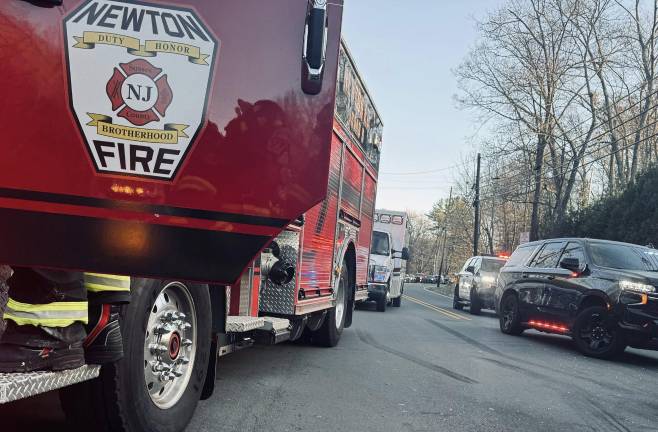 <b>Emergency personnel on scene of a three-car crash last week in Newton.</b>