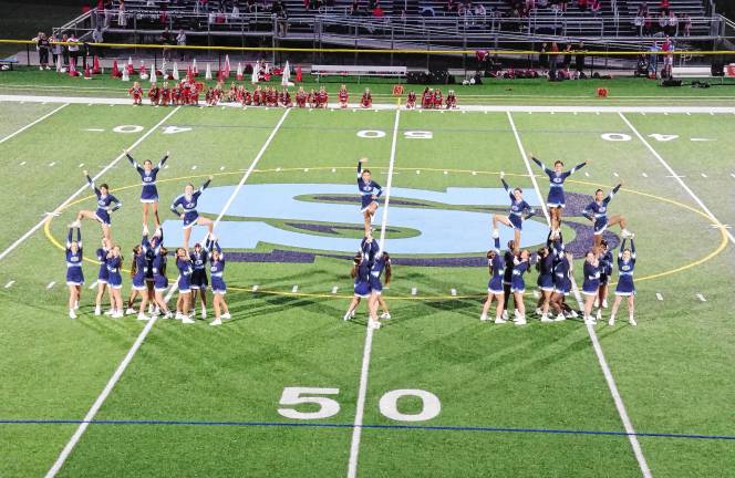 <b>The Sparta High School cheerleaders perform during halftime.</b>