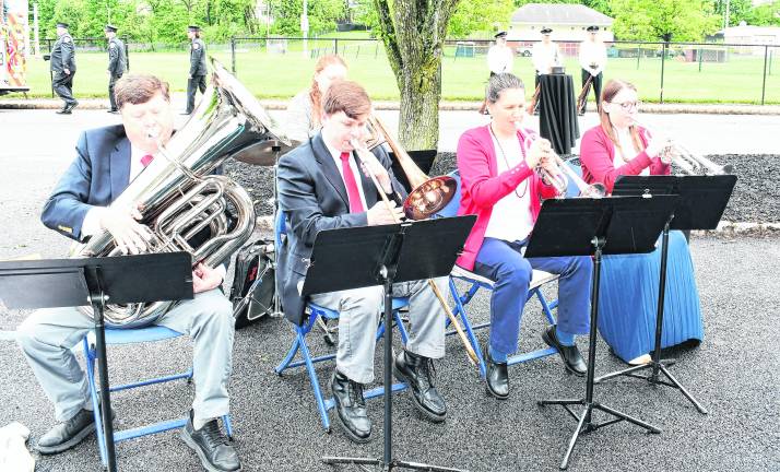 The Newton High School band performs.