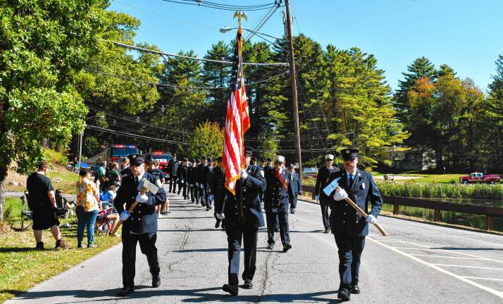 <b>ID2 Members of the Montague Volunteer Fire Department march in the parade.</b>
