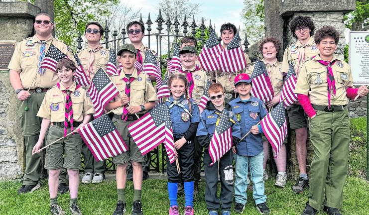 Scouts from Troop 85, Pack 85, and Pack 181 replaced over 700 flags of veterans graves at the Newton, St. Joseph’s, and Andover cemeteries on Saturday May 2.