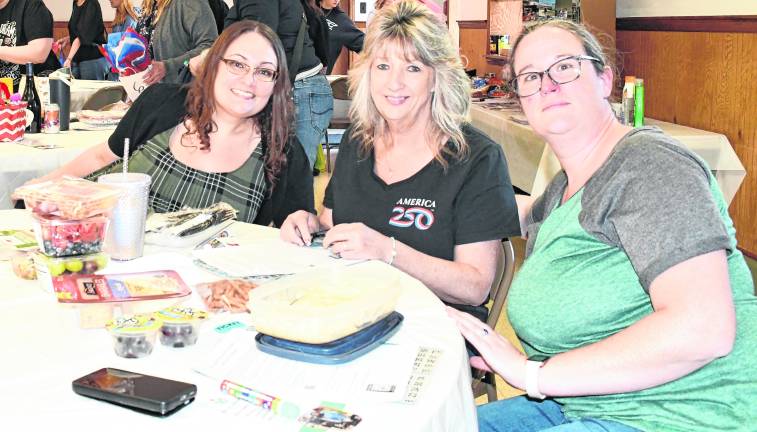 Veronica Decker of Matamoras, Pa., Tammy Zajac of Matamoras, Pa., and Jessica Eichner of Newton pose for a photo.