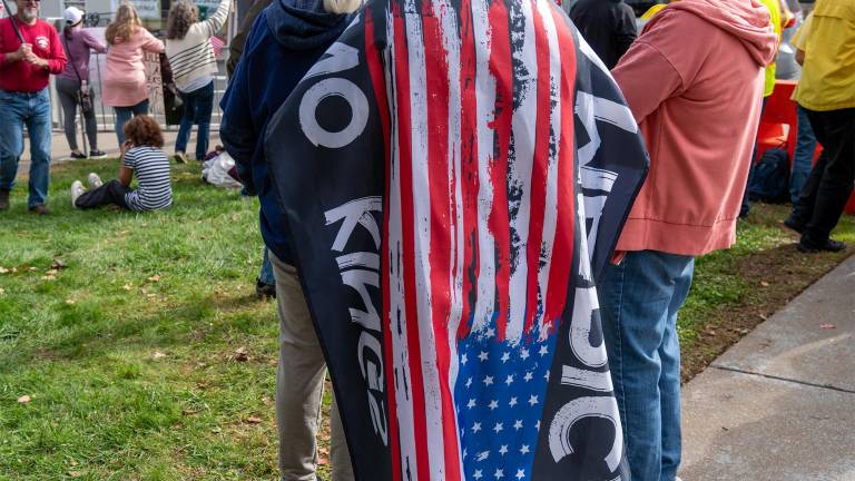 An estimated 600 people came to Newton for Saturday’s “No Kings” rally.