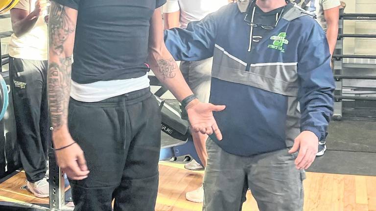 <b>Coach Bobby Leach preps the team during preseason with focused work in the weight room, building strength, discipline, and confidence ahead of the season.</b>