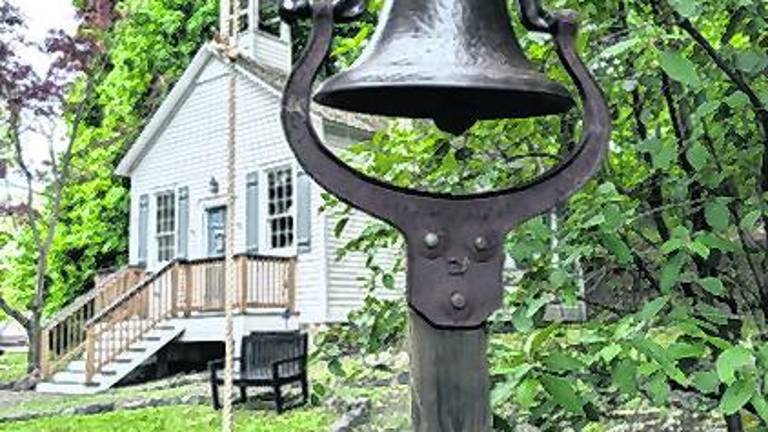 The restored school bell.