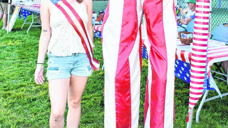 Miss Byram Keira Graham poses with Uncle Sam.