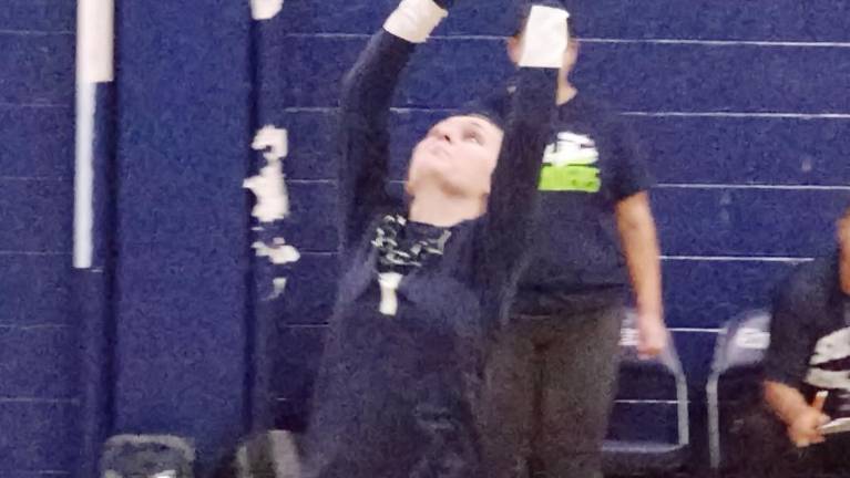 <b>Sussex Skylander's Kiarra Welsh stikes the ball.</b>