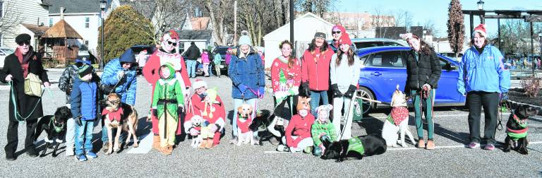 Love on the Leash Rescue is shown with dogs.
