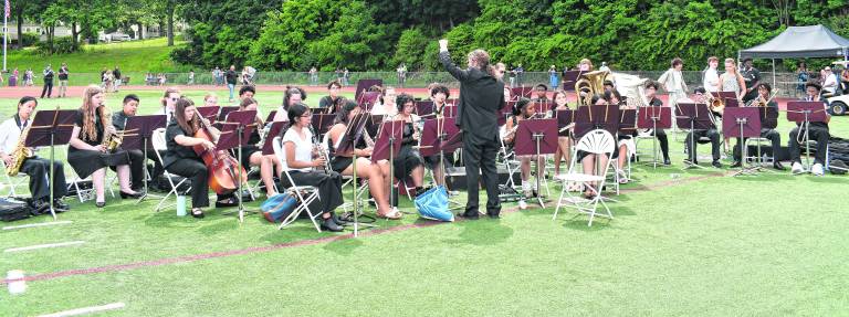 The Newton High School band performs.