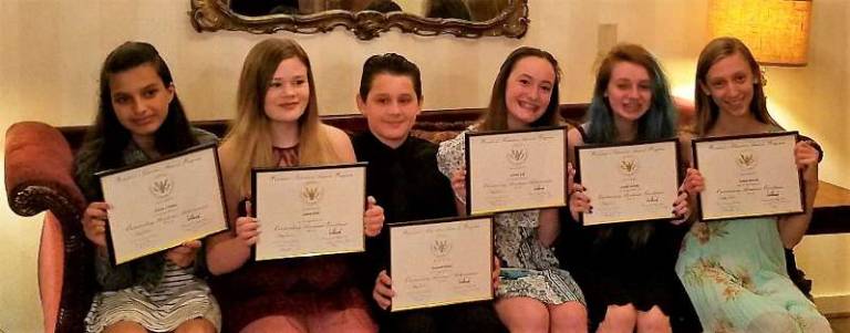8th-grade students from Long Pond School in Andover Township show off their Presidential Awards,