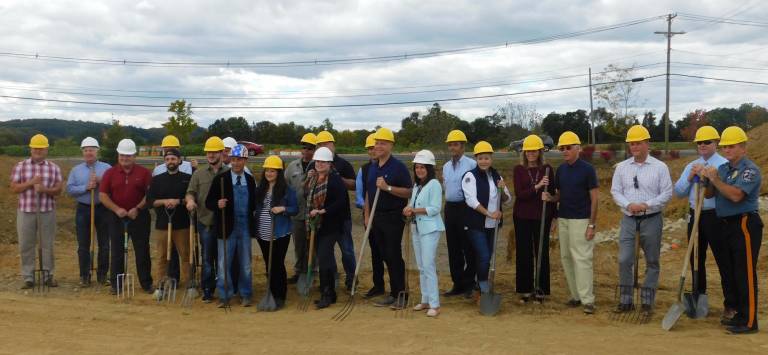 Mohawk House owners Steve and Rachael Scro are surrounded by friends, family, local dignitaries and business associates as they break ground for their new restaurant, Modern Farmer, at the new North Village on Rt.15, on Tuesday, Sept. 24, 2019.